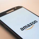 Black Samsung Galaxy smartphone displaying Amazon logo
