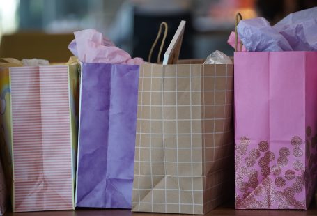 Purple and white paper bags